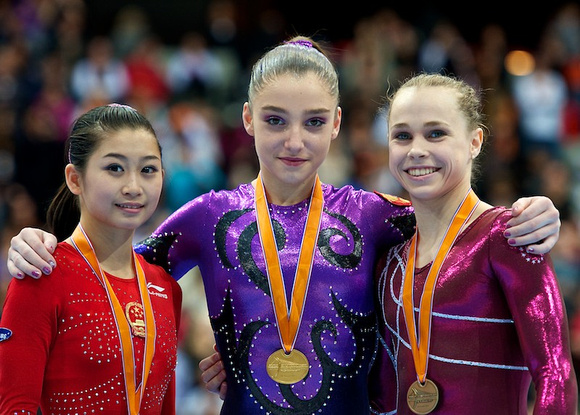Jiang Yuyan (China), Aliya Mustafina (Russia), Rebecca Bross (USA)