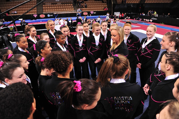 Nastia Liukin talks to the girls after the competition