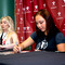 Current and former University of Utah gymnasts signed autographs before the competition.