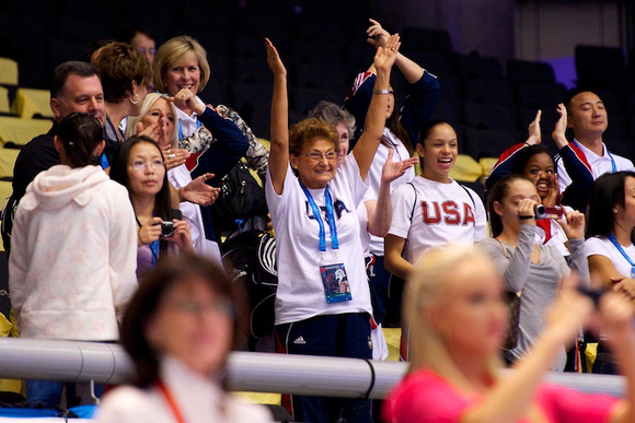 Martha Karolyi and the rest of the women's team celebrate Wieber's victory